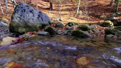 View of the River Flowing From the Mountain Waterfall