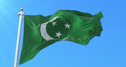 Waving Green Flag with White Crescent Moon and Stars