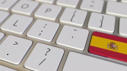 Key with Flag of Spain Switches To Key with Flag of France