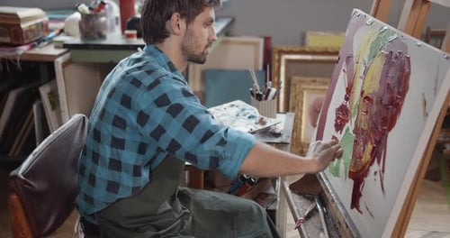 Male Painting in Studio