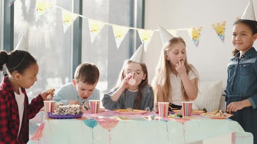 Children Celebrate a Birthday Party at Home