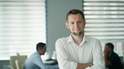 Portrait of Happy Office Worker Looking at Camera in Modern Office, Positive Male Employee with