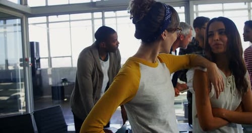 Executives interacting in office