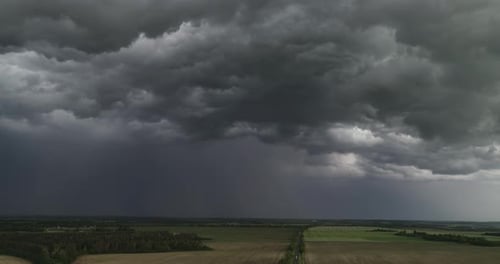 Aerial Dark Ominous Grey Storm Clouds. Dramatic Sky. Lighting In Dark Stormy Clouds