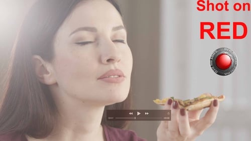 Woman Enjoys Eating Pizza Slice