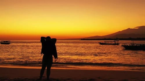 Sexy beauty model on holiday spending quality time at the beach on paradise white sand and blue 4K b