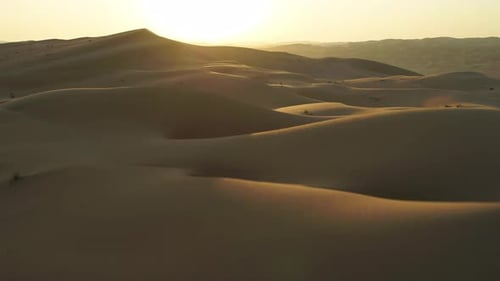 Aerial view of Dubai desert at sunset, United Arab Emirates.