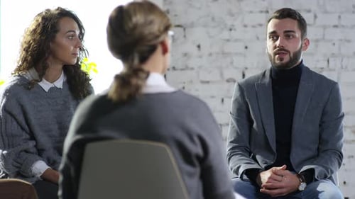 Man Talking on Support Group Meeting