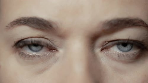 Extreme Close Up of Woman's Blue Eyes