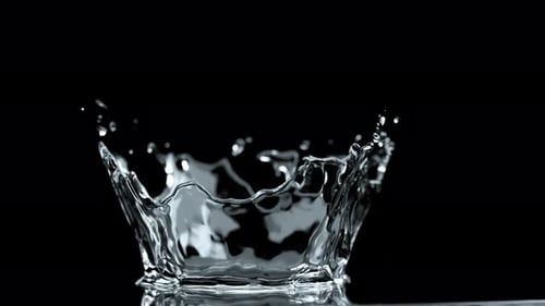 Realistic Water Splash Crown on Black Background