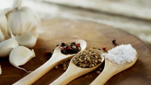 Close Up of Garlic and Spices on Wood