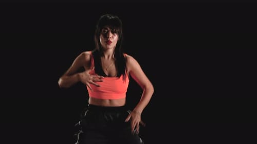 Energetic Woman Dancing in Studio