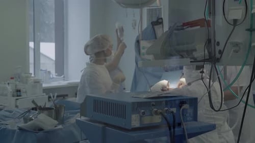 Surgeons Performing Surgery in Sterile Operating Room