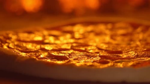 Pepperoni Pizza Cooking in a Hot Oven