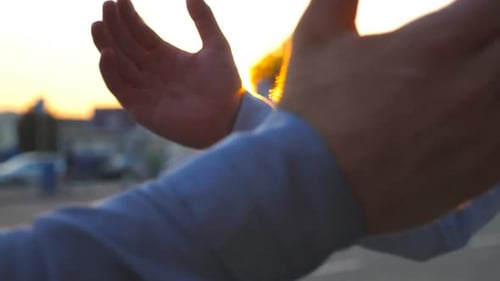 Close Up of Two Businessmen Meeting on City Street and Having a Firm Friendly Handshake. Young