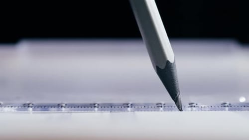 Drawing Line with Pencil and Ruler Plan Blueprint Closeup