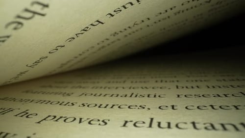 Extreme Close Up of Open Book with Text