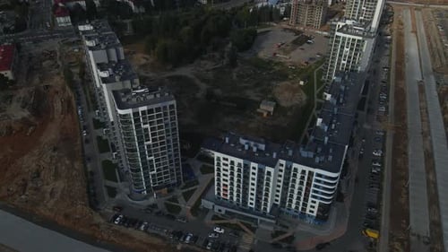 Construction of a modern city block. Multi-storey buildings