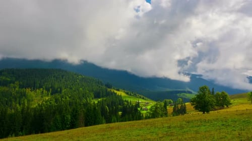Mountain Landscape with a Fast Clouds and Shadows