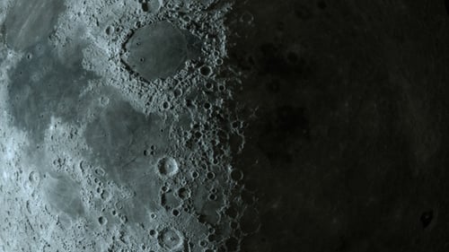 Realistic Moon Surface Slowly Panning Across Craters and Shadow