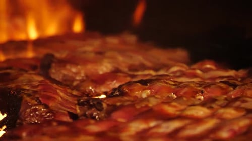 Ribs Roasting over Open Flame