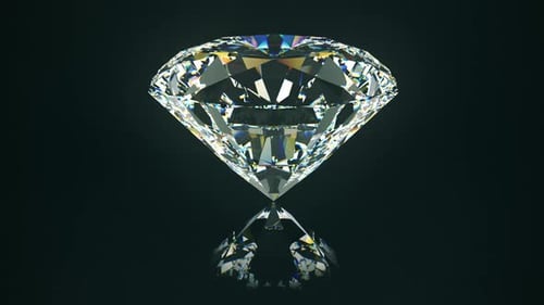Brilliant Cut Diamond Rotating Elegantly on Reflective Surface