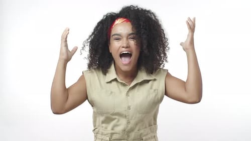 Girl Feeling Ecstatic and Amused Hear Excellent Astonishing News Raising Hands Up Say Wow See