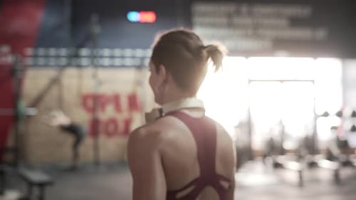 Woman Walking in an Indoor Gym