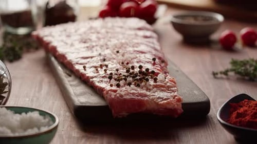 Woman Chef Cooking Ribs Closeup