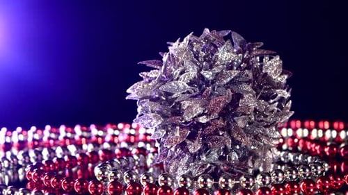 Unusual Silver Toy for Christmas or New Year and Beads, Rotation, Back Light, on Black, Close Up