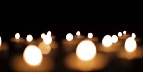 Burning Candles Out of Focus