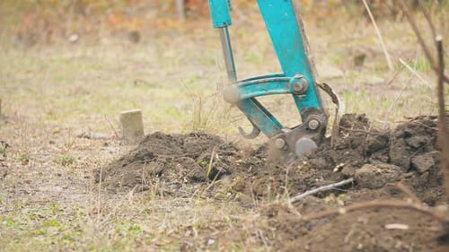 Excavator Digger Shovel Digging Into The Soil
