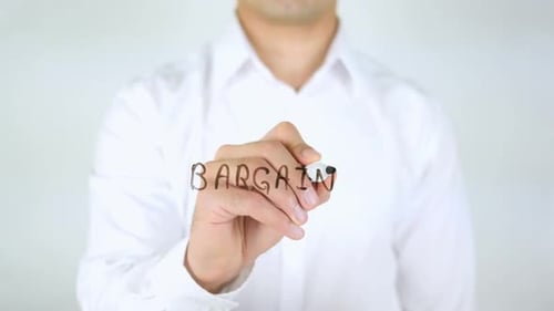 Man Writes Bargain on Clear Surface