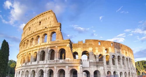 Roman Colosseum timelapse during sunset in Rome, Italy.