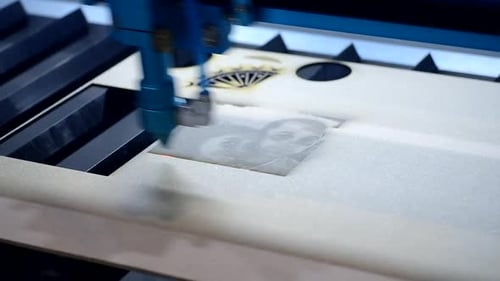 Laser Cutting Machine Etches Design onto Flat Material