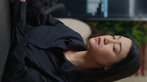 Woman Coding in a Corporate Environment