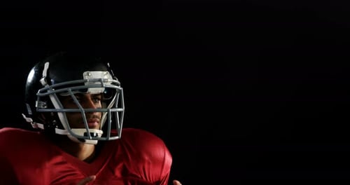 American Football-Spieler fängt den Ball