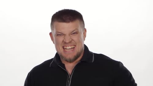 Angry Man Gritting Teeth and Gesturing