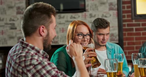 In the Bar Restaurant Beautiful Woman Shares Good News with Her Dear Friends They Congratulate