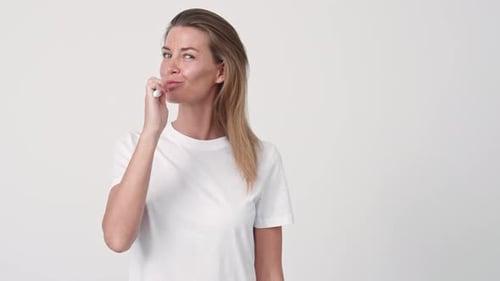 Woman Brushing Teeth for Healthy Dental Hygiene