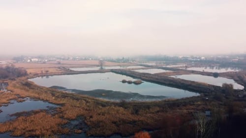 Aerial Drone View Flight Over Artificially Created Lakes for Breeding Fish