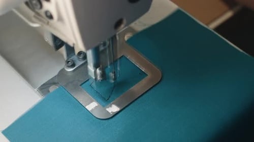 Sewing Machine Stitching Blue Fabric