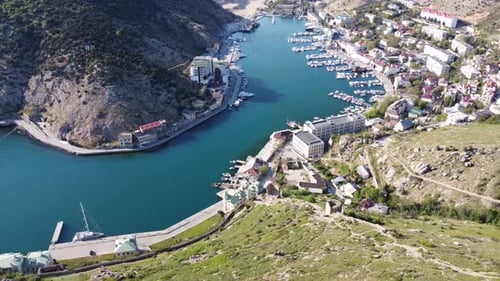 City on the Coast Among the High Mountains and the Sea Bay