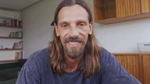 Man Talking to Camera Indoors