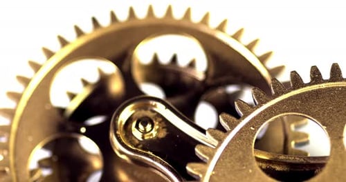 Golden Gears Turning in Close Up Detail