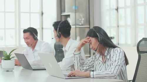 A Woman Call Centre Agents Headache Because Her Colleagues Are Talking With Each Other