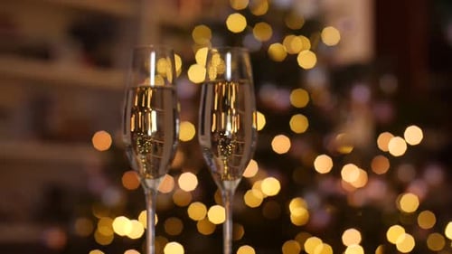 Champagne Glasses Toasting to the Holidays