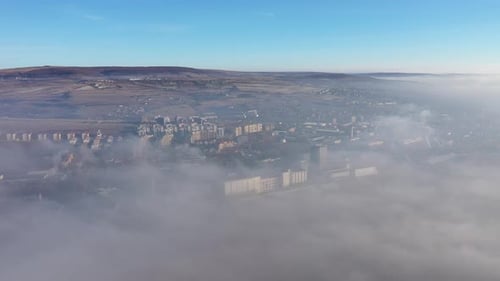 Aerial View of Polluted Industrial Urban Area. View of Smog From a Flying Drone