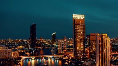 Time Lapse Night Cityscape and Highrise Buildings in Metropolis City Center