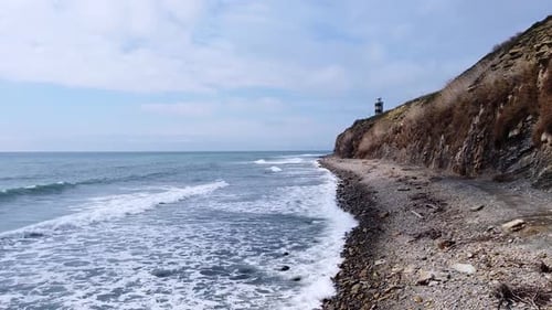 Lighthouse on the sea coast